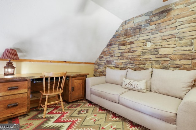 office area featuring vaulted ceiling