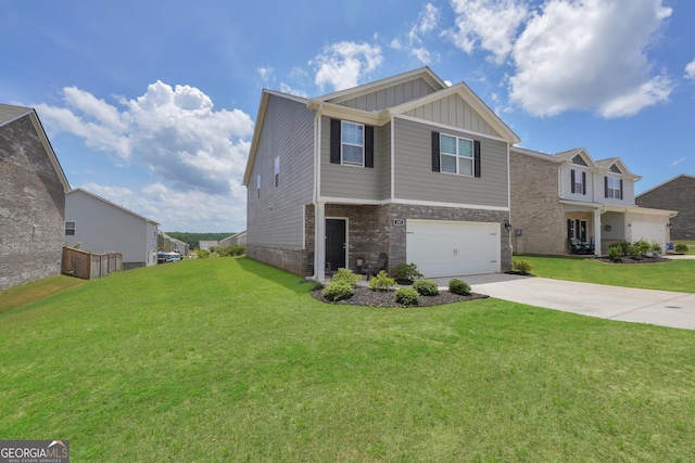 view of front of house with a garage and a front yard