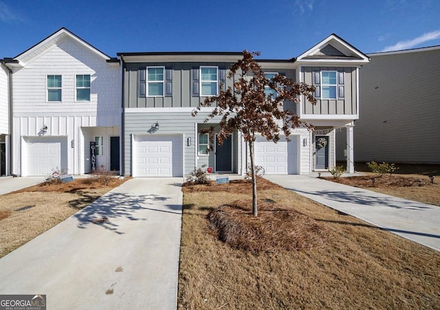 townhome / multi-family property featuring a garage