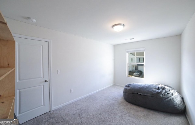 living area with carpet floors