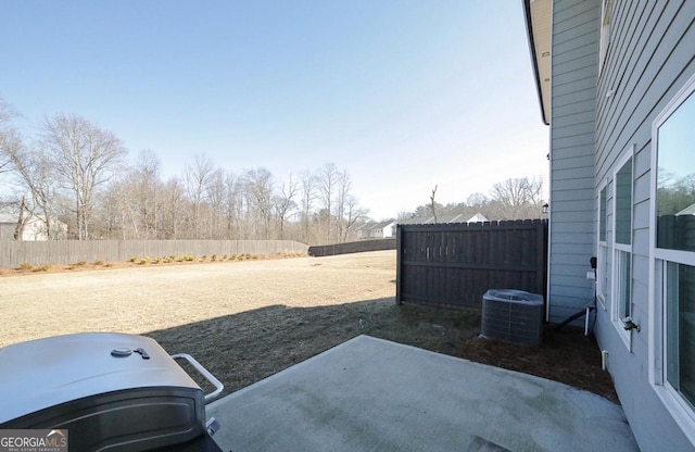 view of yard featuring central AC