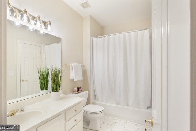 full bathroom with tile patterned flooring, vanity, toilet, and shower / bath combo