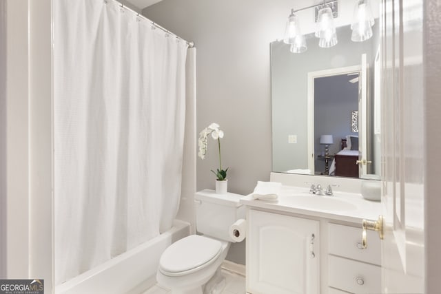 full bathroom featuring shower / tub combo, vanity, and toilet