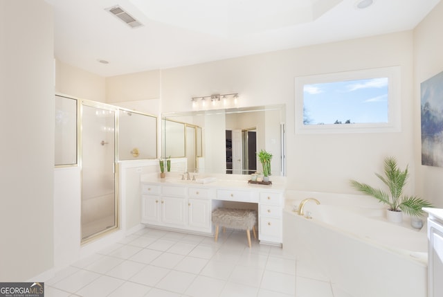 bathroom with separate shower and tub, tile patterned floors, and vanity