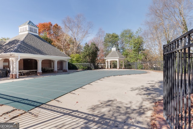 view of pool featuring a gazebo and a patio area