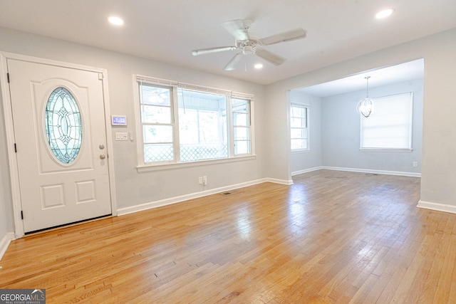 foyer featuring ceiling fan and light hardwood / wood-style flooring