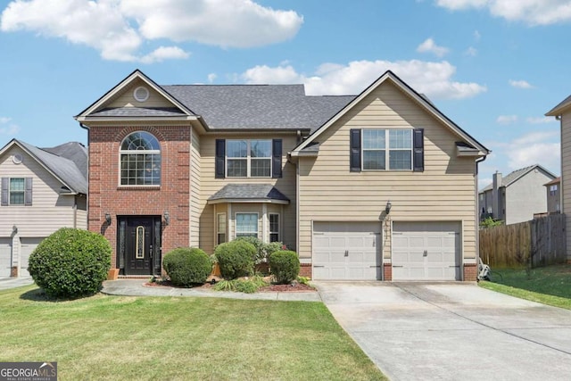 traditional home featuring brick siding, an attached garage, driveway, and a shingled roof