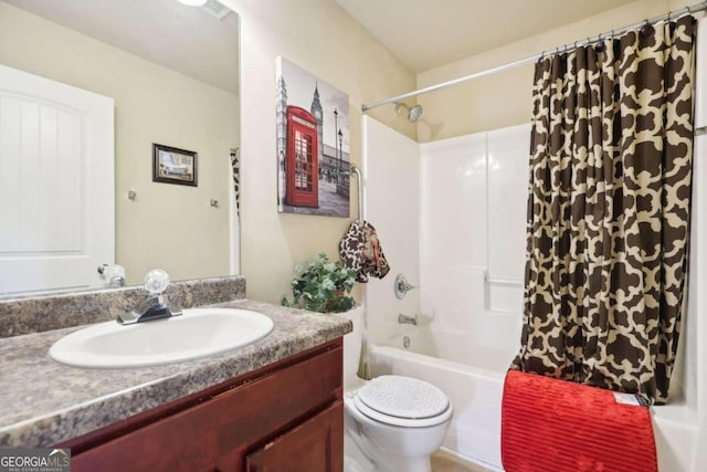 bathroom with toilet, shower / bath combination with curtain, and vanity