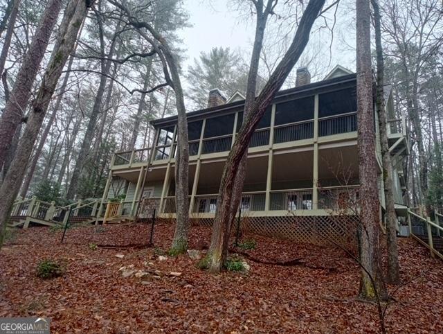 exterior space featuring a carport and covered porch