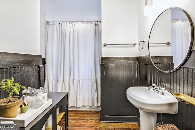 bathroom featuring hardwood / wood-style flooring