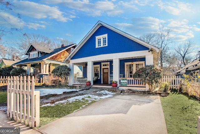 view of front of home featuring covered porch