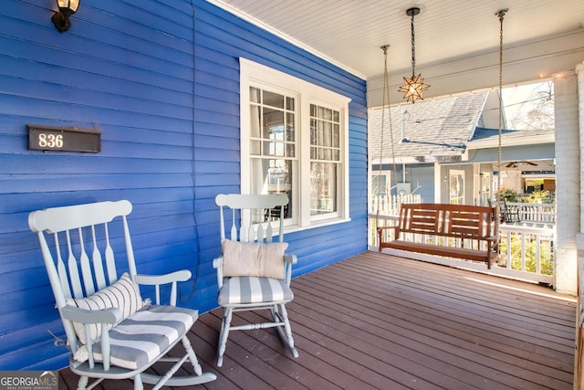 wooden deck with a porch