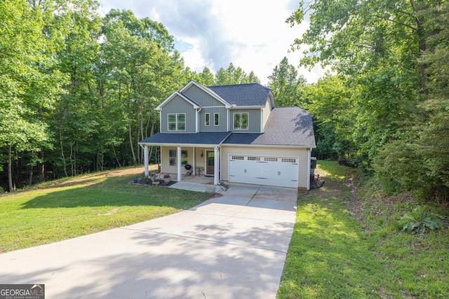 192 Celestial Run, Winder, GA 30680 - traditional-style house featuring covered porch, driveway, a front yard, an attached garage, and board and batten siding