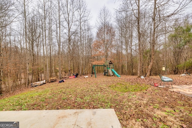 view of yard with a playground