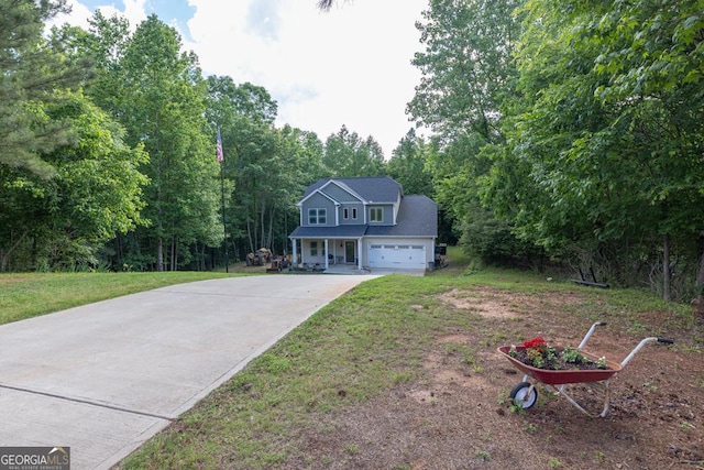 192 Celestial Run, Winder, GA 30680 - view of front of property with concrete driveway, a front lawn, and an attached garage