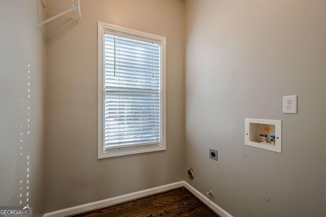 laundry room featuring hookup for a washing machine, dark hardwood / wood-style floors, and electric dryer hookup