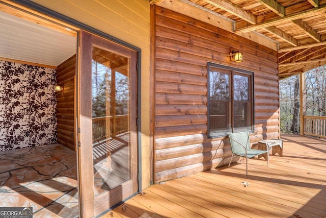 wooden terrace with a porch