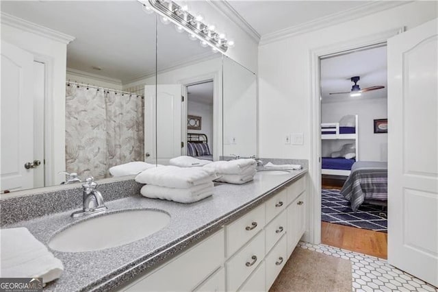 bathroom with ceiling fan, tile patterned flooring, ornamental molding, a shower with curtain, and vanity