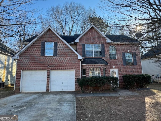 916 Brisley Cir, Hampton, GA 30228 - view of front of house featuring a garage and central air condition unit