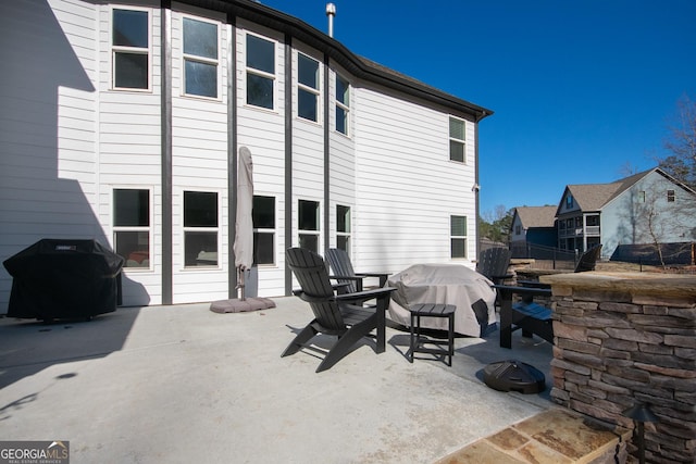 rear view of house featuring a patio area