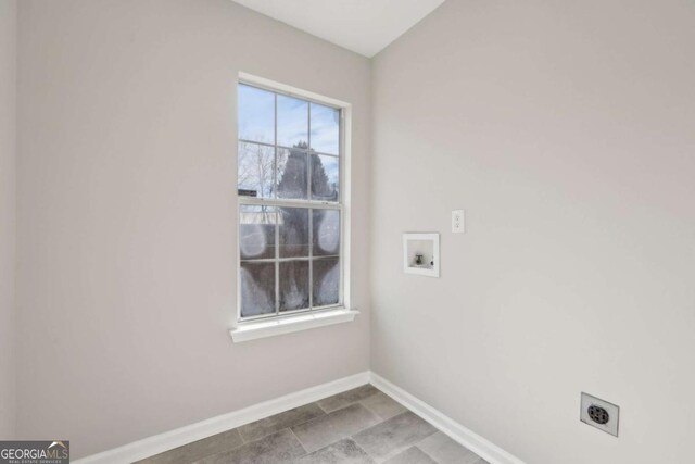 laundry area with washer hookup and electric dryer hookup