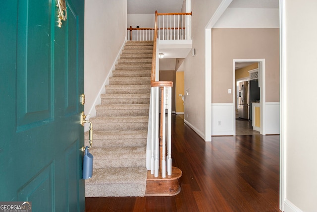 foyer featuring dark wood-type flooring