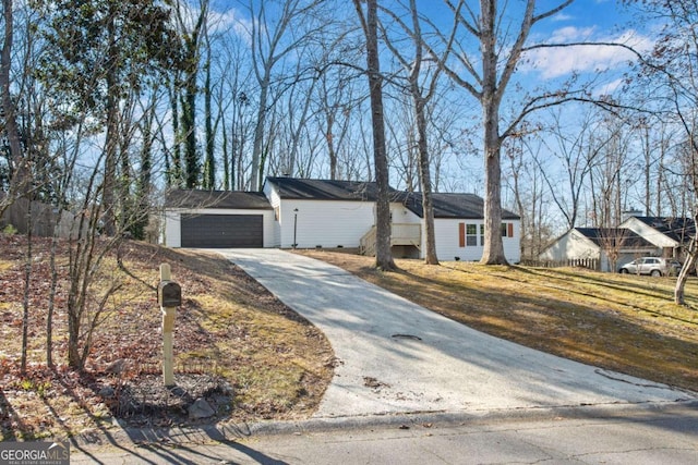 single story home featuring a garage