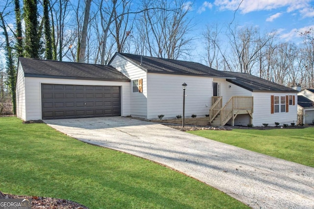 exterior space with a front yard and a garage