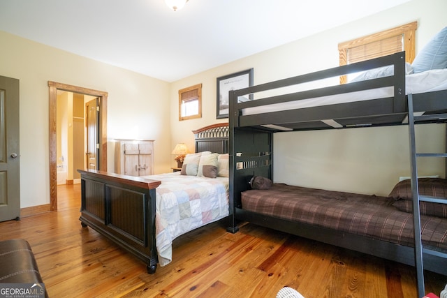 bedroom with light wood-type flooring