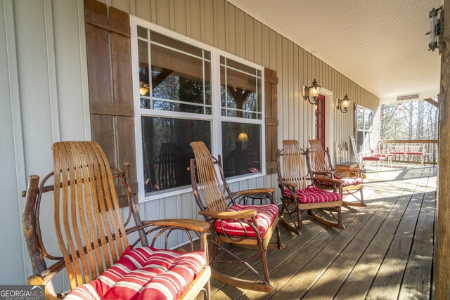 wooden terrace with covered porch