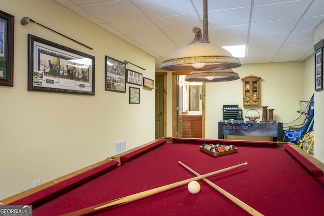 game room with a drop ceiling and pool table