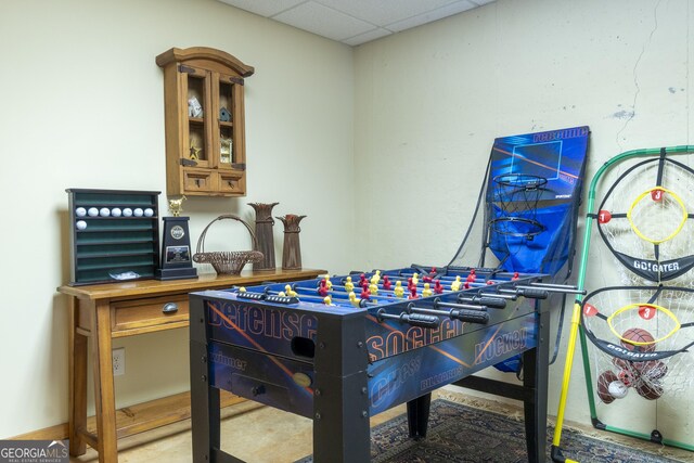 game room with a drop ceiling and billiards