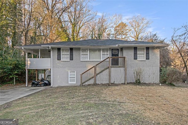 view of front of property with a carport