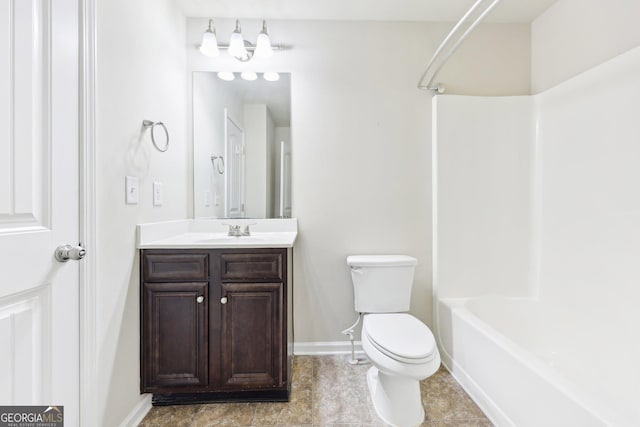 full bathroom featuring vanity, toilet, and washtub / shower combination