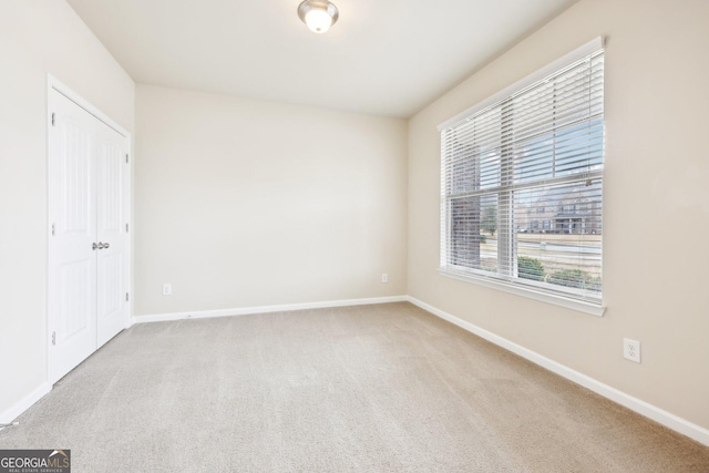 view of carpeted spare room