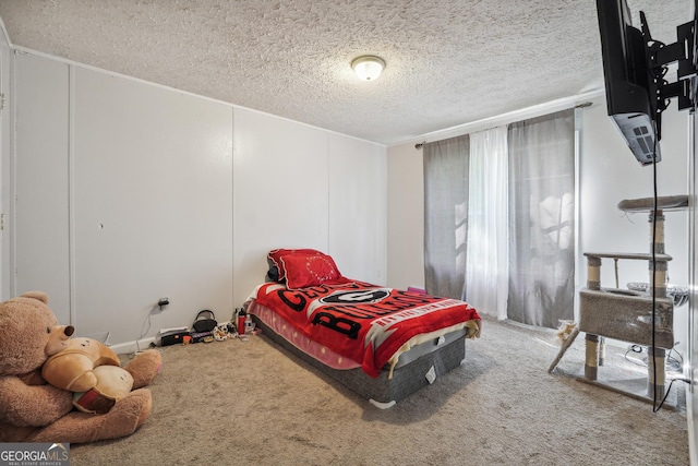 carpeted bedroom with a textured ceiling