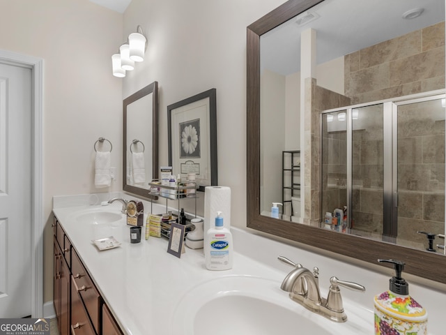 bathroom with vanity and walk in shower