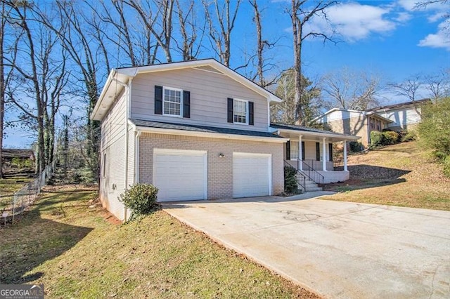 view of front of property featuring a porch, a front yard, and a garage