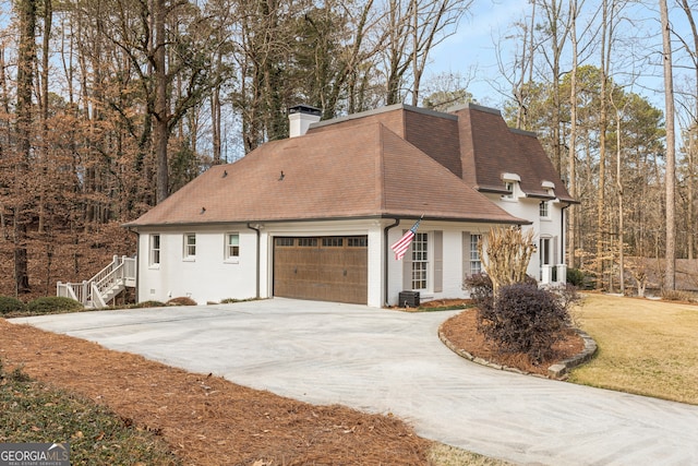 view of side of home featuring a lawn