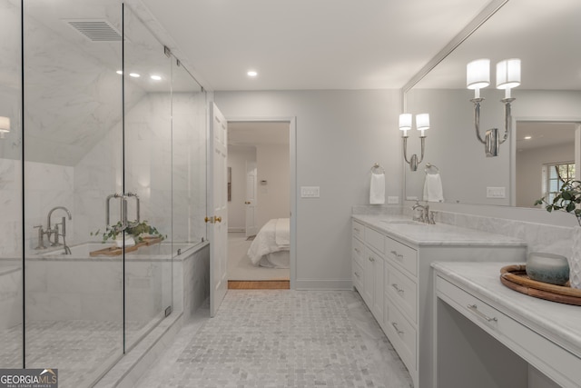 bathroom with tile patterned flooring, vanity, and a shower with door