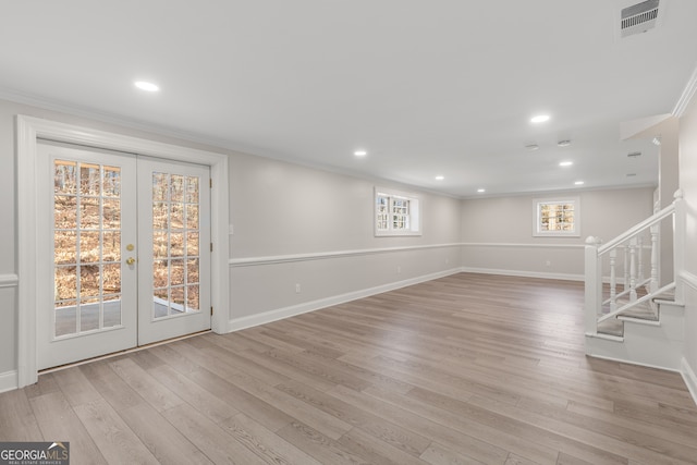 interior space featuring light hardwood / wood-style flooring and ornamental molding