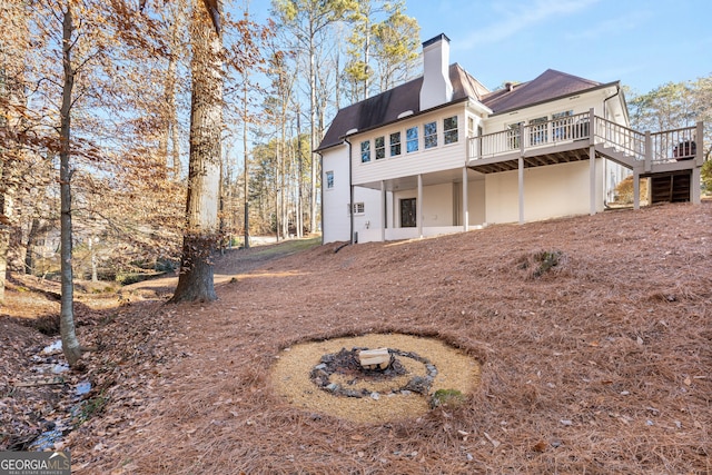 rear view of house with a deck