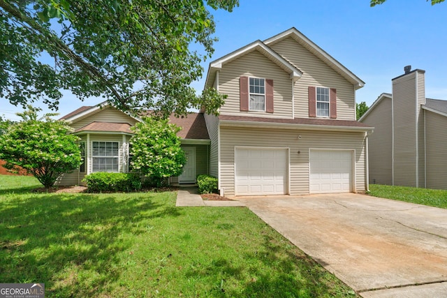 view of front property with a garage and a front lawn