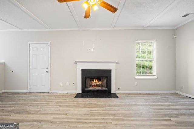 unfurnished living room with ceiling fan and light hardwood / wood-style flooring