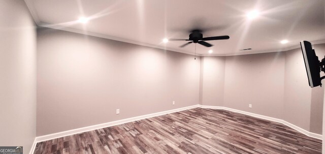 1030 Lake Haynes Dr NE, Conyers, GA 30012 - unfurnished room with wood finished floors, ceiling fan, baseboards, ornamental molding, and recessed lighting