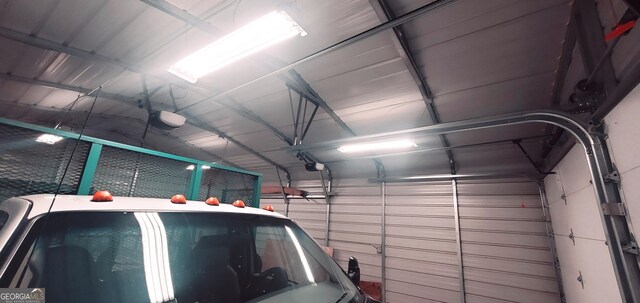 1030 Lake Haynes Dr NE, Conyers, GA 30012 - garage featuring a garage door opener