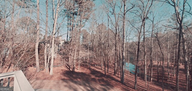 1030 Lake Haynes Dr NE, Conyers, GA 30012 - deck featuring a view of trees