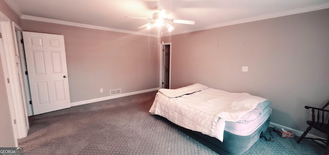 bedroom featuring ceiling fan, dark carpet, and ornamental molding