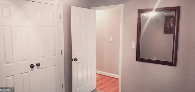 corridor featuring light hardwood / wood-style flooring