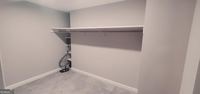 1030 Lake Haynes Dr NE, Conyers, GA 30012 - laundry room with baseboards and carpet flooring
